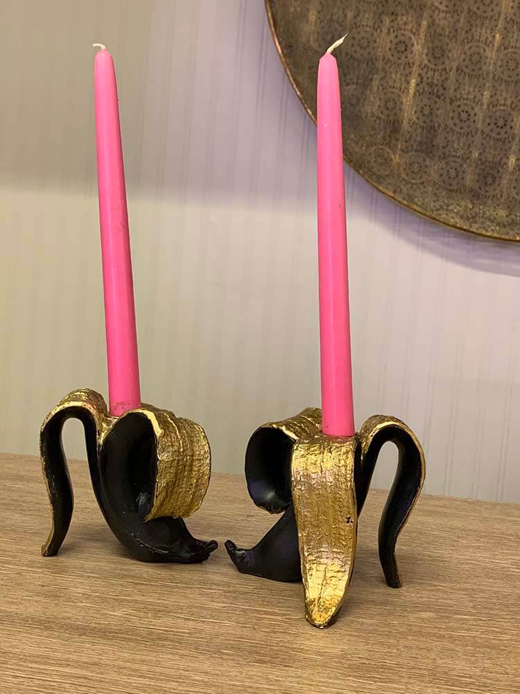 black and gold banana candlesticks