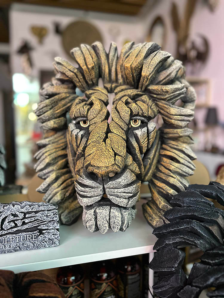 Lion bust outdoor sculpture by Edge sculpture 