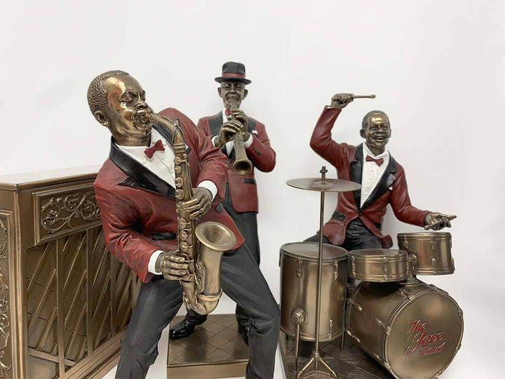 Vintage jazz musician bronze figurine, Alto Sax player, drummer, Clariant player 