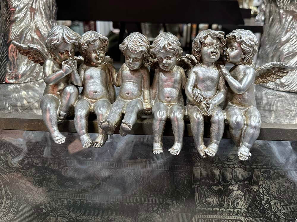 Antique Silver Sitting Row of Cherubs